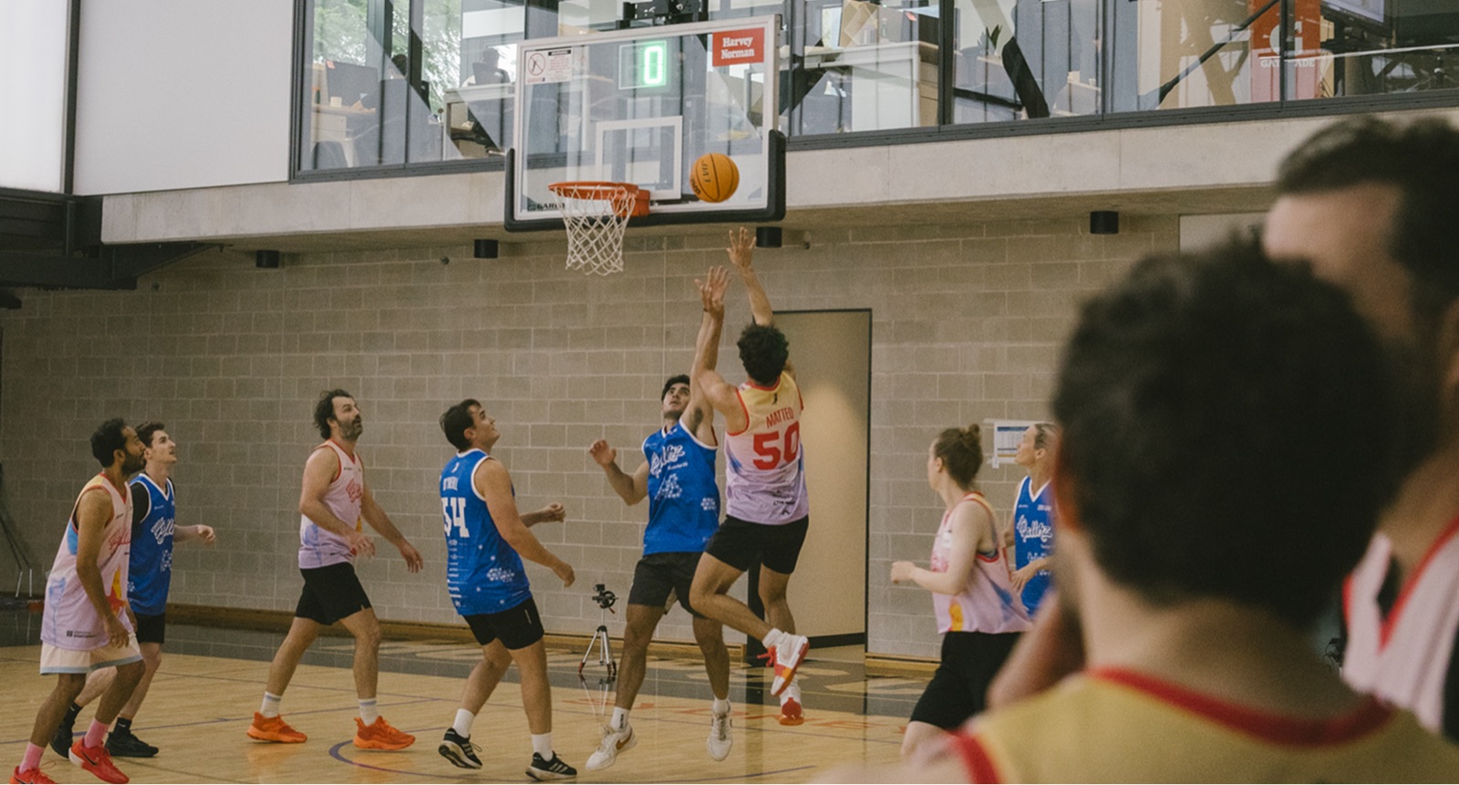 A shot going up under the ring during a Startup Ball game